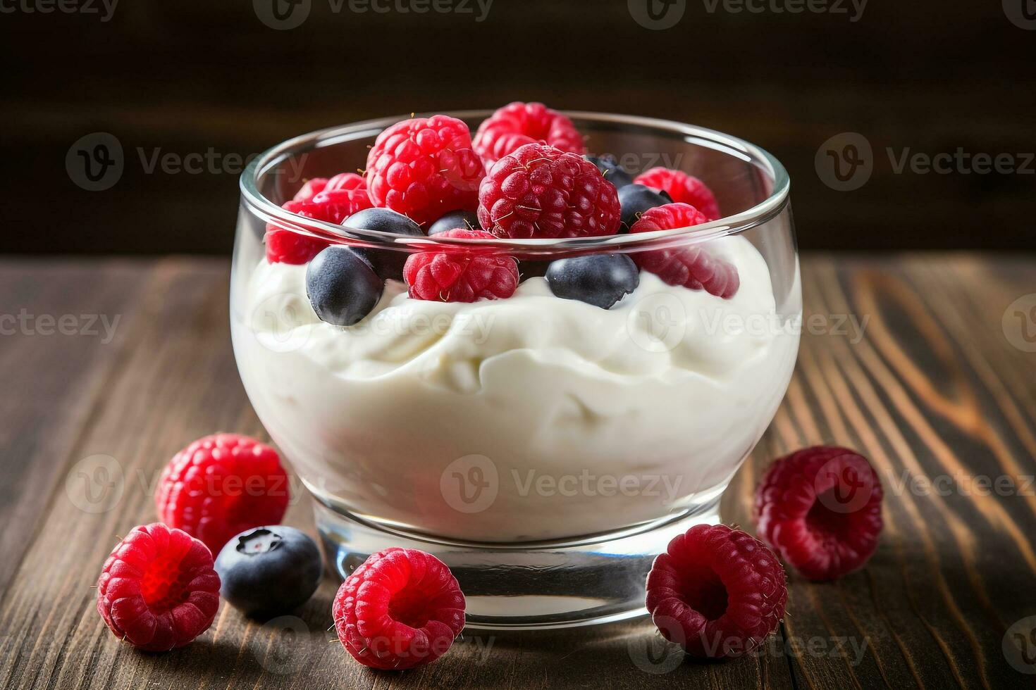 Yogurt with berries on wooden background photo