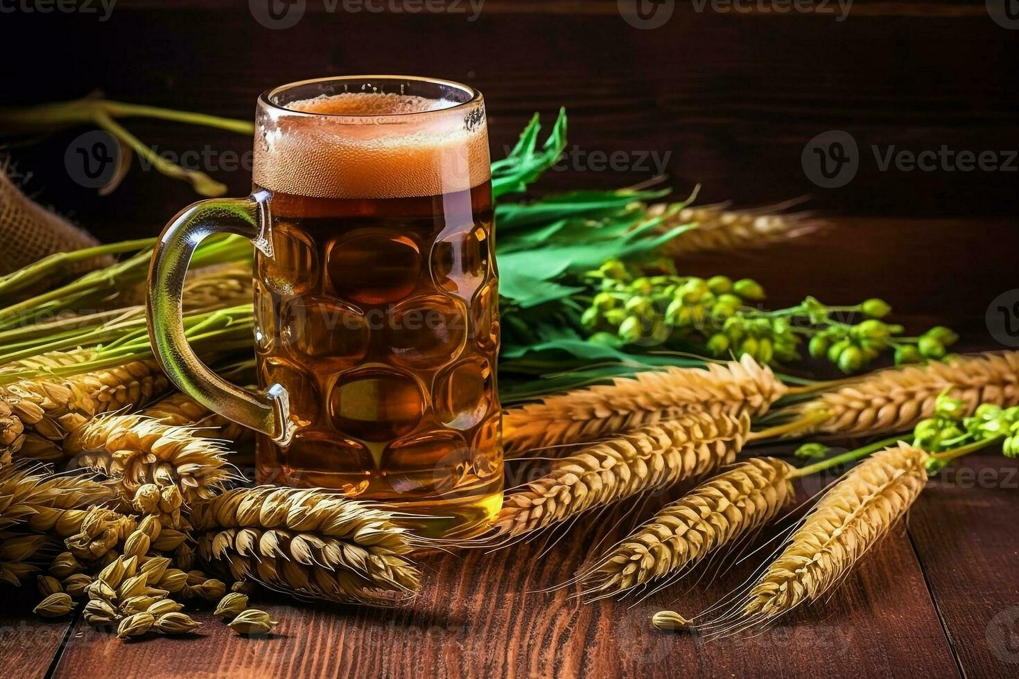 Beer with ears of wheat on wooden background photo