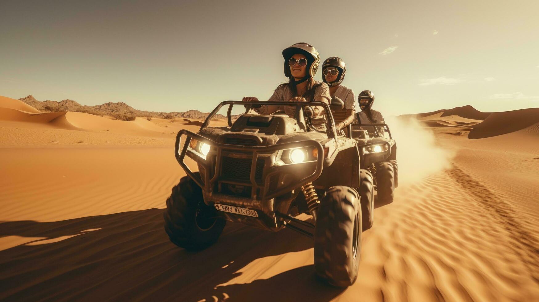 A young couple rides in a buggy through the desert in the UAE photo