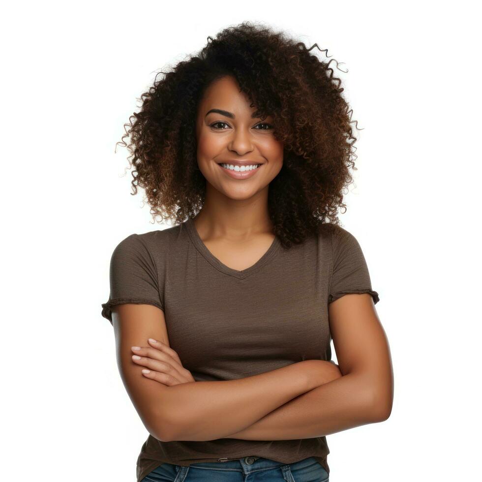 Happy black woman standing with arms crossed isolated photo