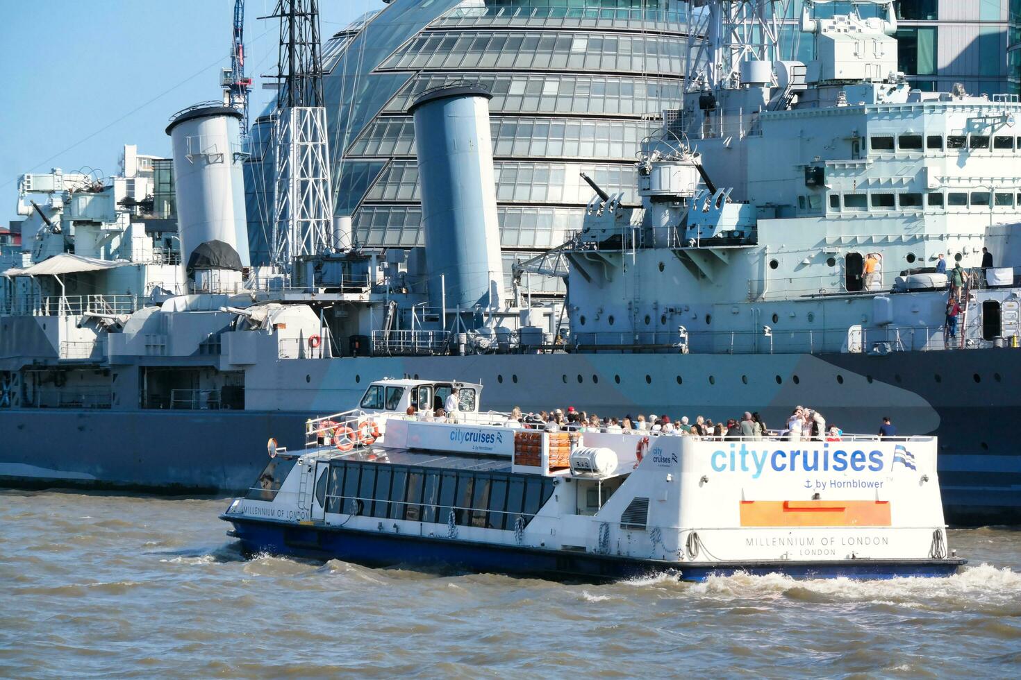 Best View of Boat over River Thames Waters at London Bridge, Capital City of England Great Britain. The Image Was Captured June 4th, 2023 photo
