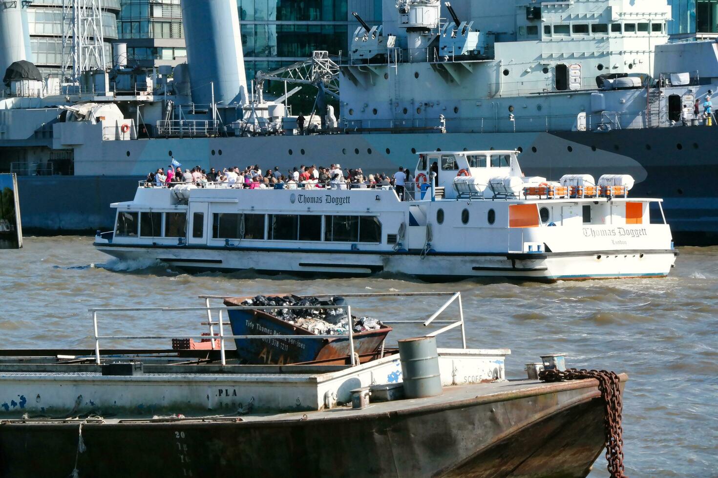 Best View of Boat over River Thames Waters at London Bridge, Capital City of England Great Britain. The Image Was Captured June 4th, 2023 photo