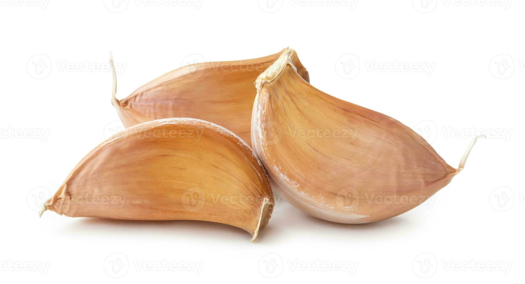 Fresh garlic cloves in stack isolated on white background with clipping path. photo