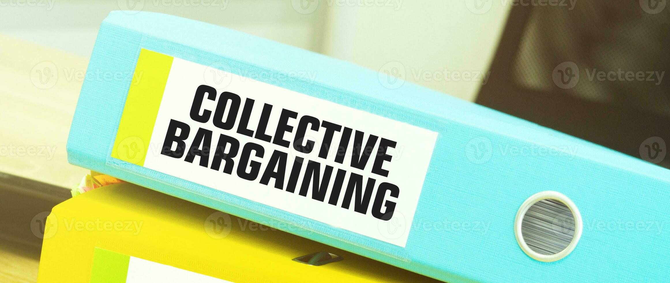 Two office folders with text COLLECTIVE BARGAINING photo