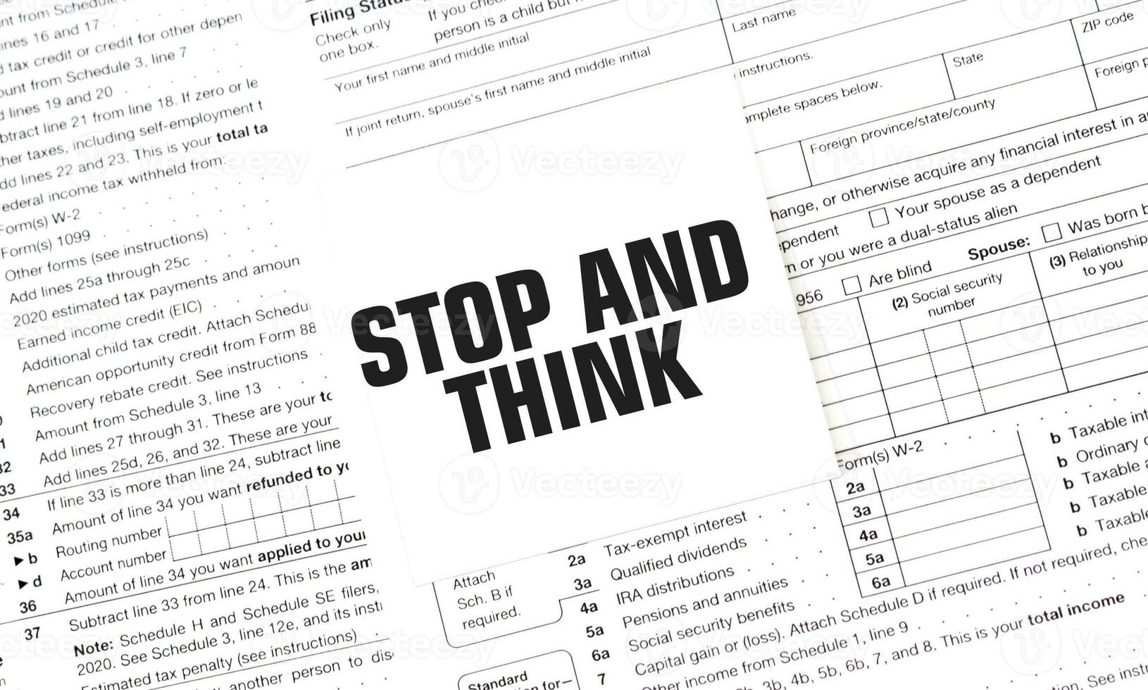 STOP AND THINK on white sticker with documents photo