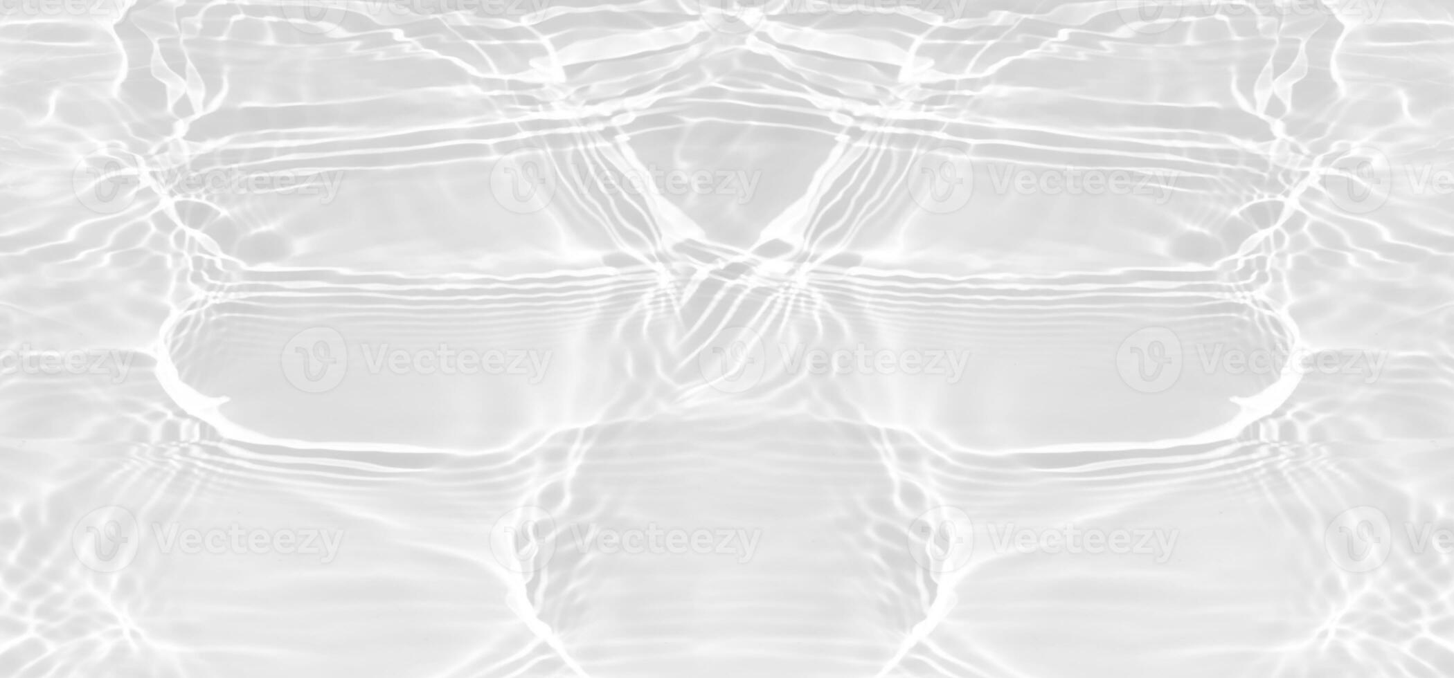 White water with ripples on the surface. Defocus blurred transparent white colored clear calm water surface texture with splashes and bubbles. Water waves with shining pattern texture background. photo