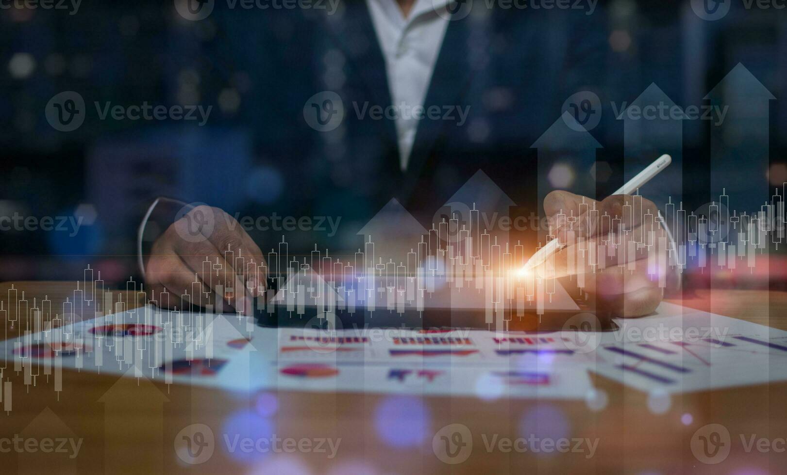 Businessman using the tablet. Data analytics report and key performance indicators on information dashboard for Business strategy, Stock market indicator and financial investment photo