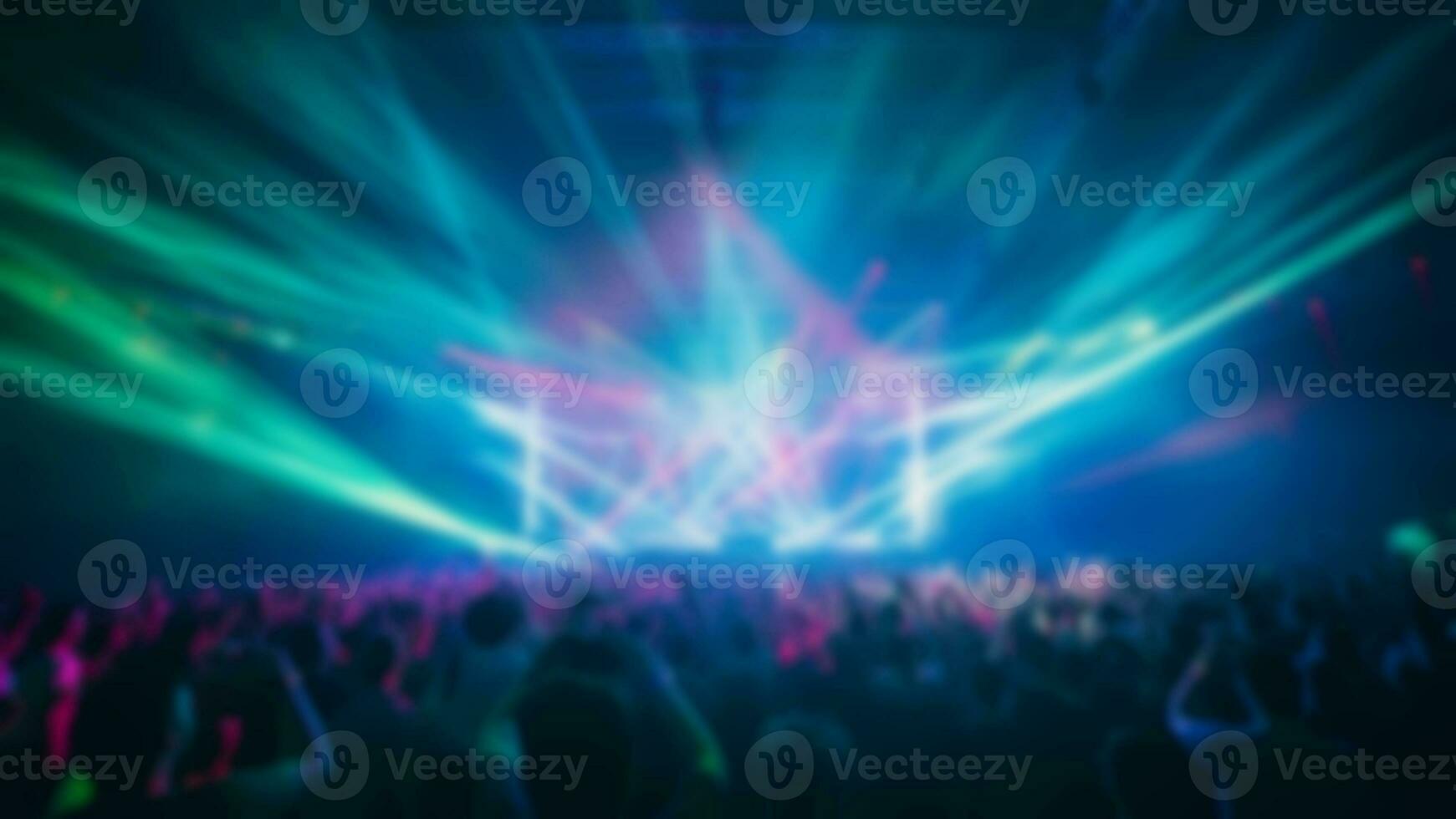 Blur crowd audience watching live show in concert hall or venue stadium with colorful lighting background. generative AI photo