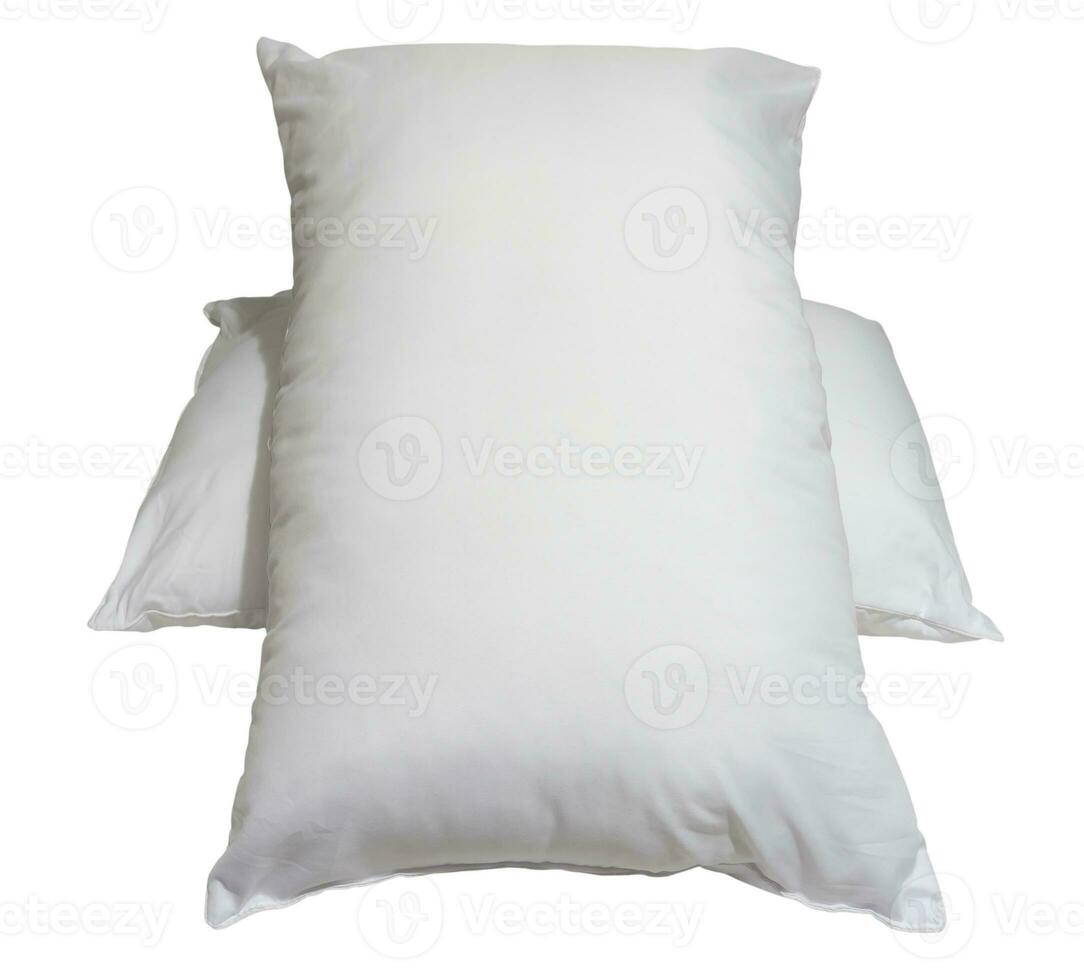 White pillows in stack in hotel or resort room isolated on white background with clipping path. Concept of comfortable and happy sleep in daily life photo