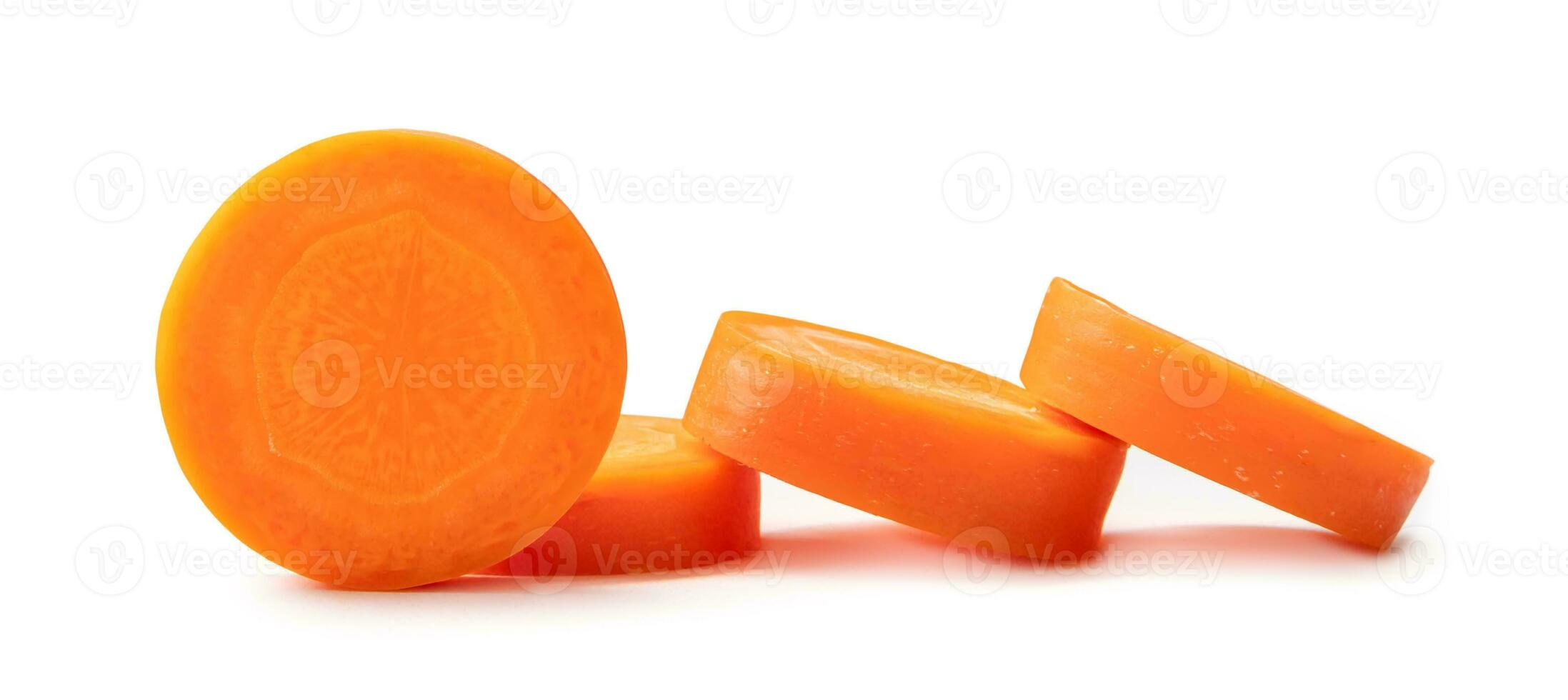 Fresh beautiful carrot slices in stack isolated on white background witch clipping path. Front view. photo