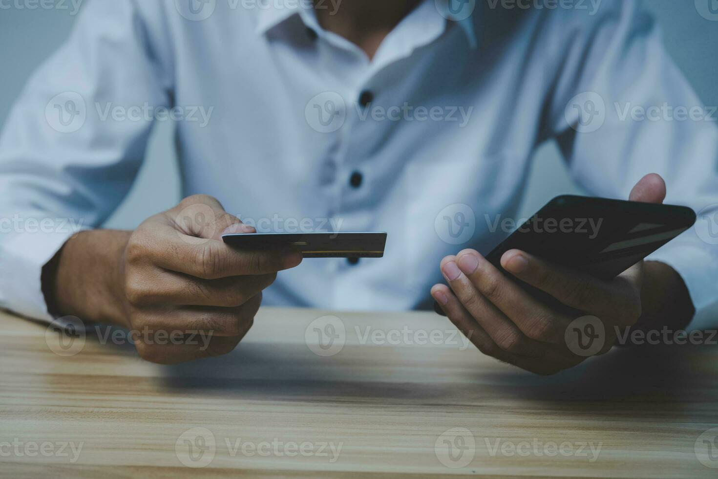 Cyber Security. people hand entering password code on mobile phone paying bill with credit card in home office, internet, digital marketing, mobile banking, online payment, digital technology concept photo