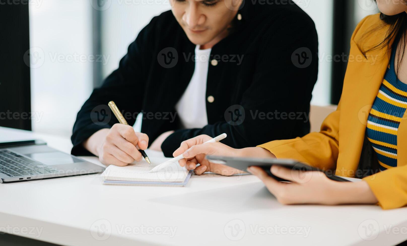 Business team meeting. professional investor working new start up project. Finance task. with smart phone and laptop and digital tablet computer photo