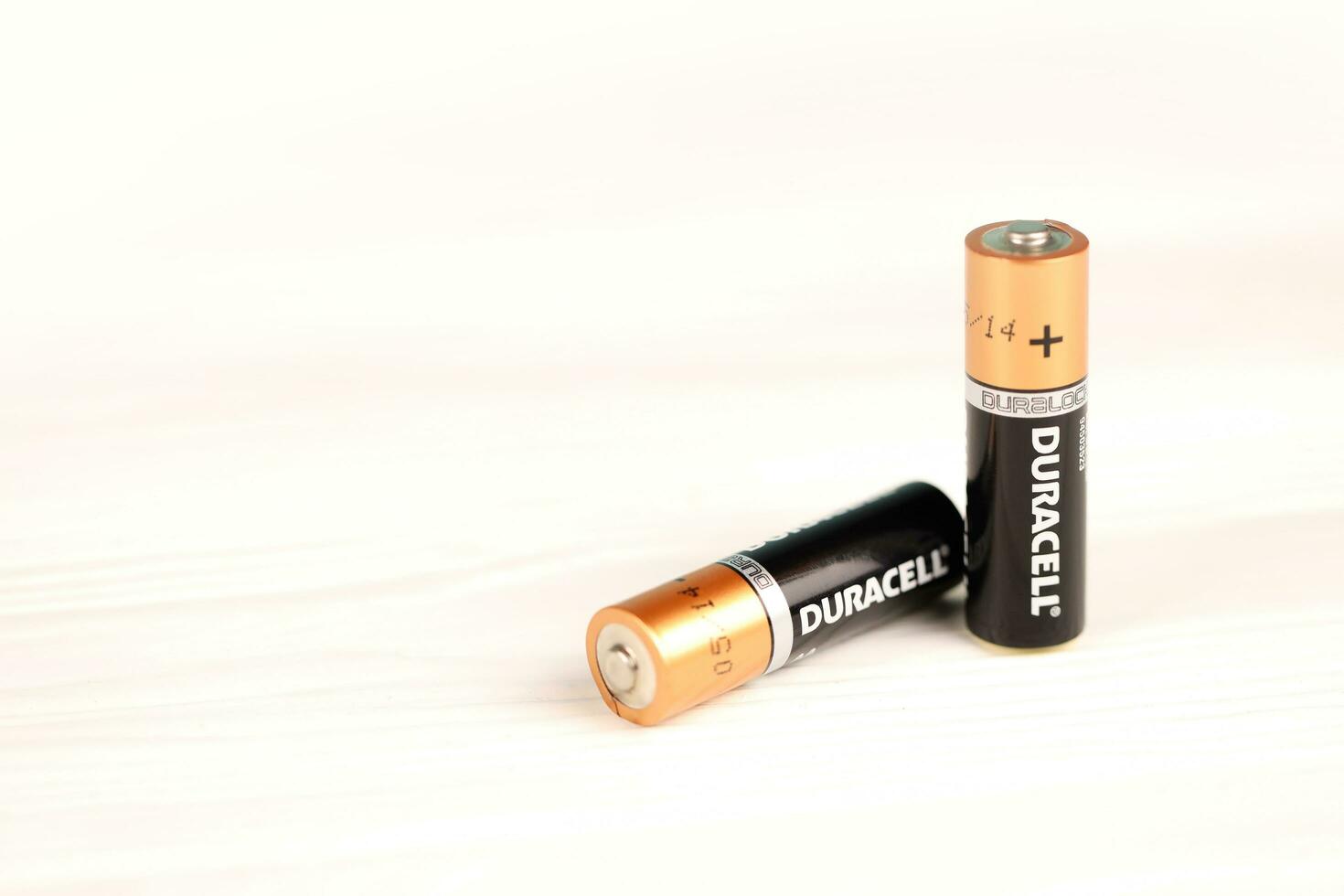 Duracell batteries on white background. Duracell is an American brand of batteries and smart power solutions manufactured by Procter and Gamble photo