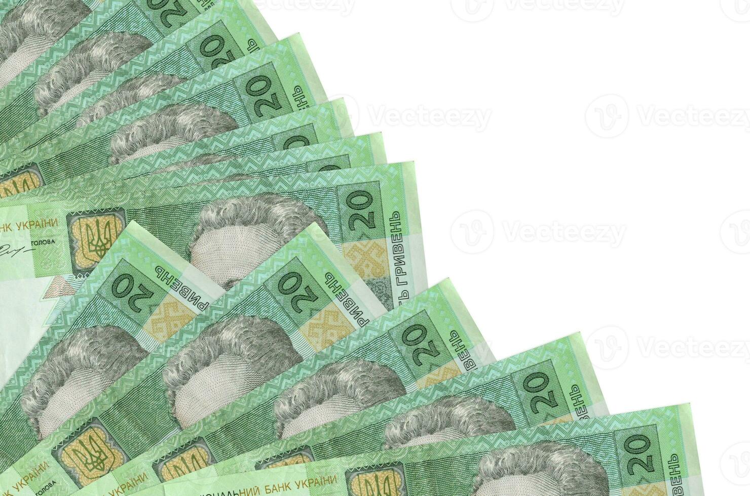 20 Ukrainian hryvnias bills lies isolated on white background with copy space stacked in fan close up photo