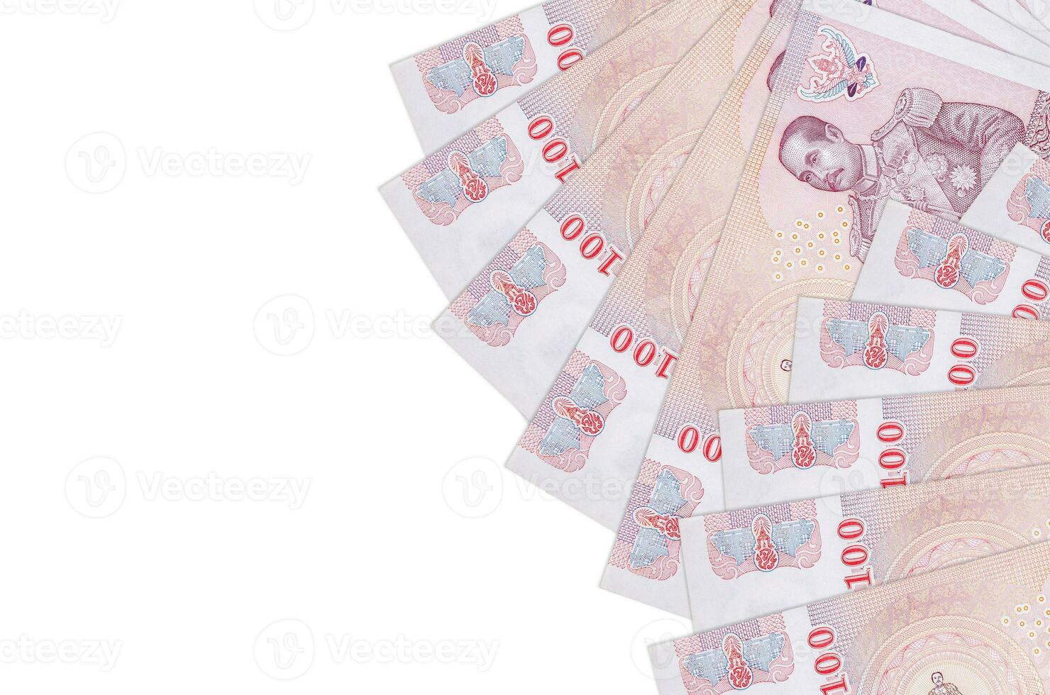 100 Thai Baht bills lies isolated on white background with copy space. Rich life conceptual background photo