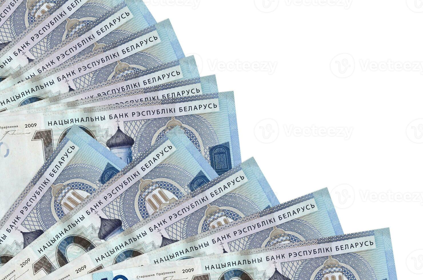10 Belorussian rubles bills lies isolated on white background with copy space stacked in fan close up photo