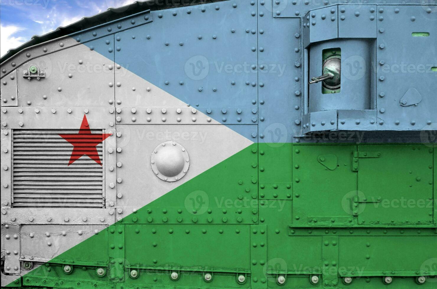 Djibouti flag depicted on side part of military armored tank closeup. Army forces conceptual background photo