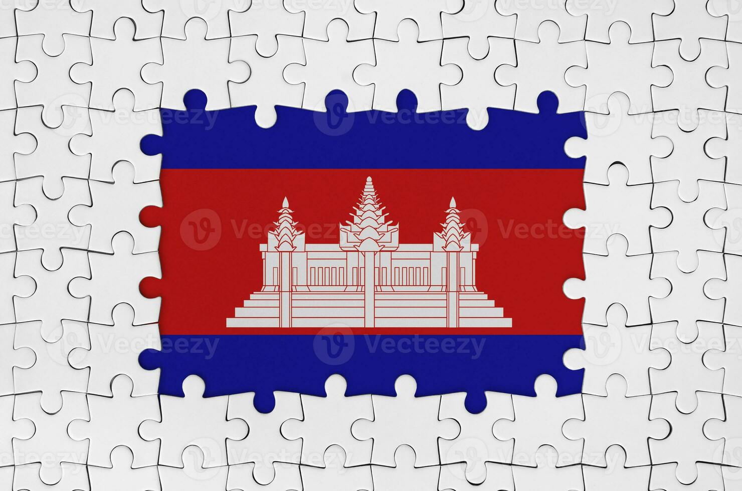 Cambodia flag in frame of white puzzle pieces with missing central part photo