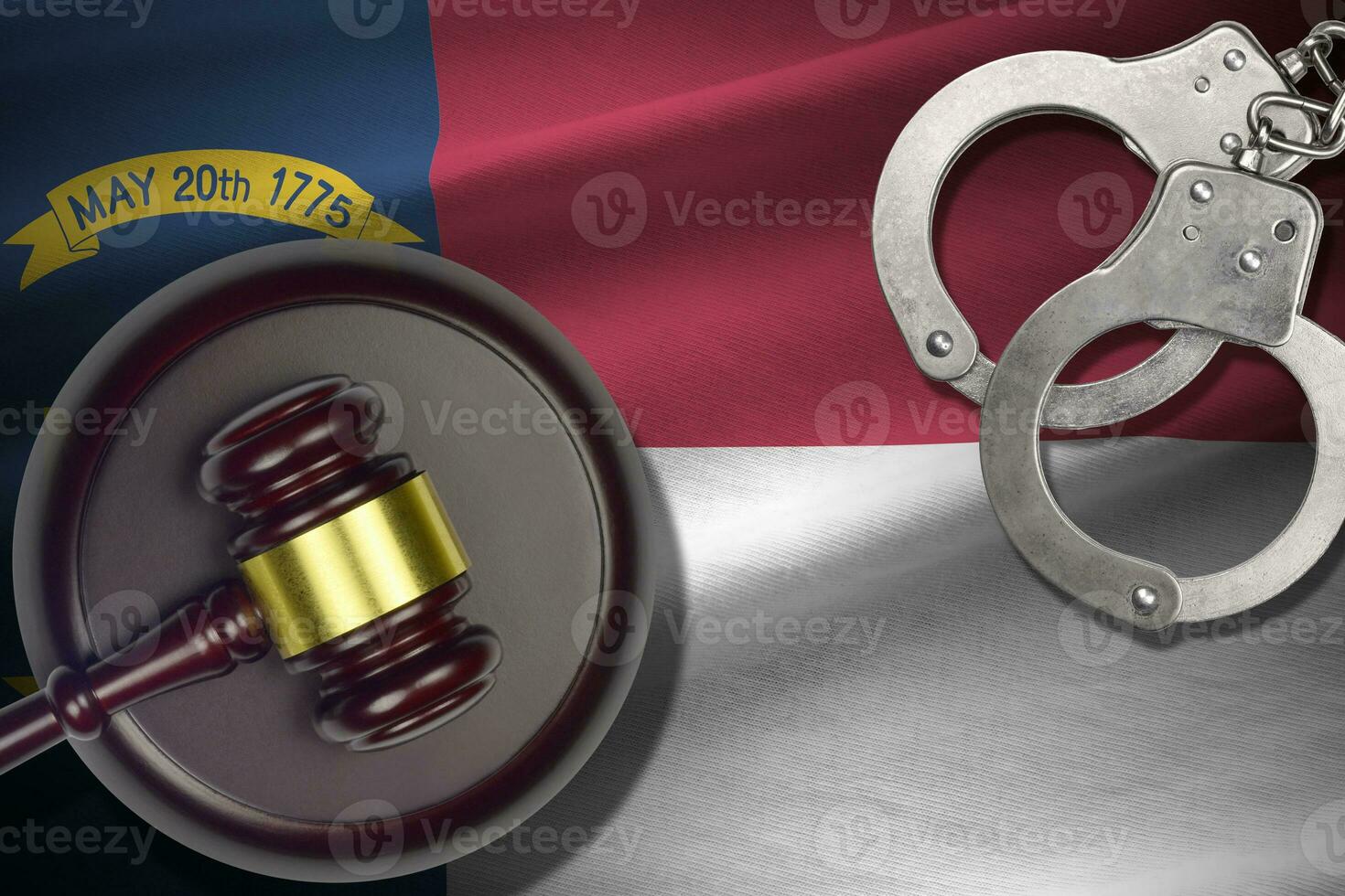 North Carolina US state flag with judge mallet and handcuffs in dark room. Concept of criminal and punishment photo