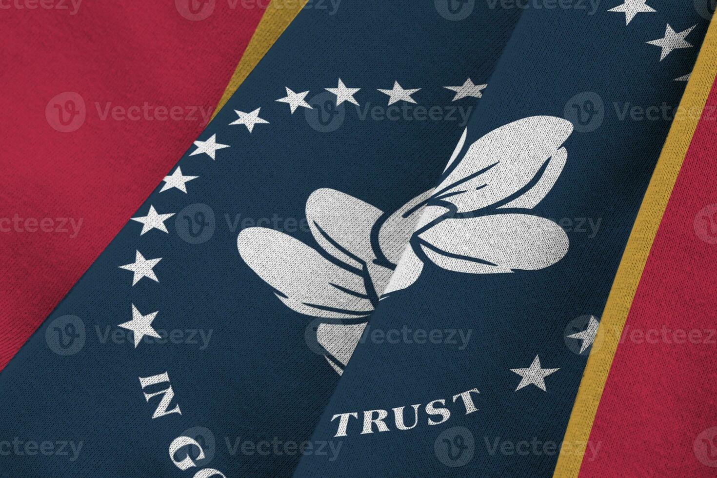 Mississippi new US state flag with big folds waving close up under the studio light indoors. The official symbols and colors in banner photo