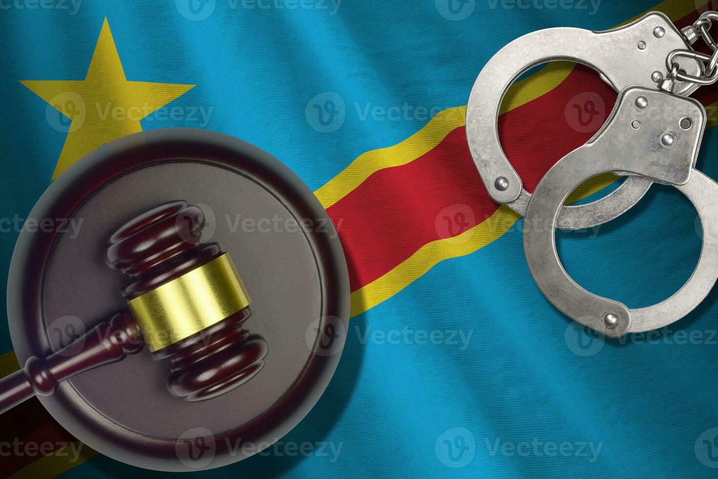 Democratic Republic of the Congo flag with judge mallet and handcuffs in dark room. Concept of criminal and punishment, background for judgement topics photo