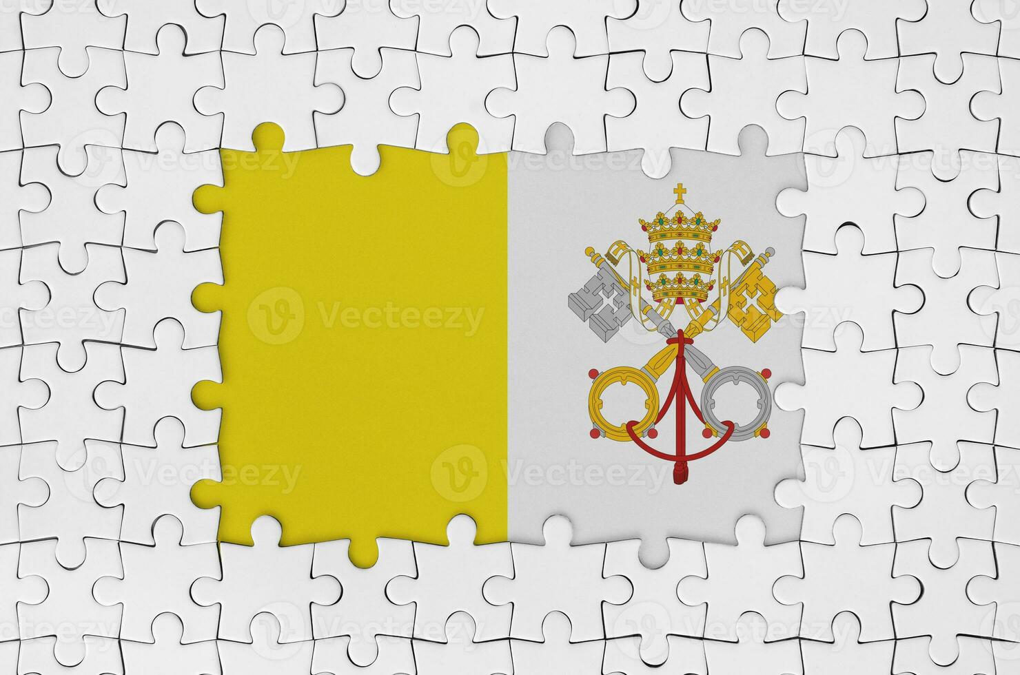 Vatican City State flag in frame of white puzzle pieces with missing central part photo