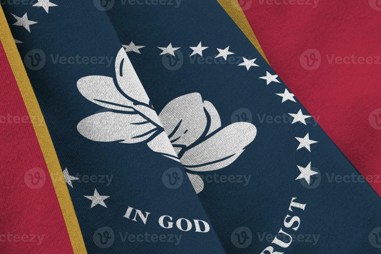 Mississippi new US state flag with big folds waving close up under the studio light indoors. The official symbols and colors in banner photo