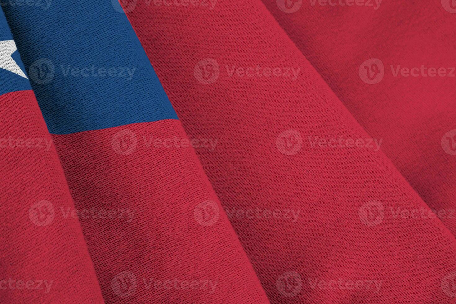 Samoa flag with big folds waving close up under the studio light indoors. The official symbols and colors in banner photo