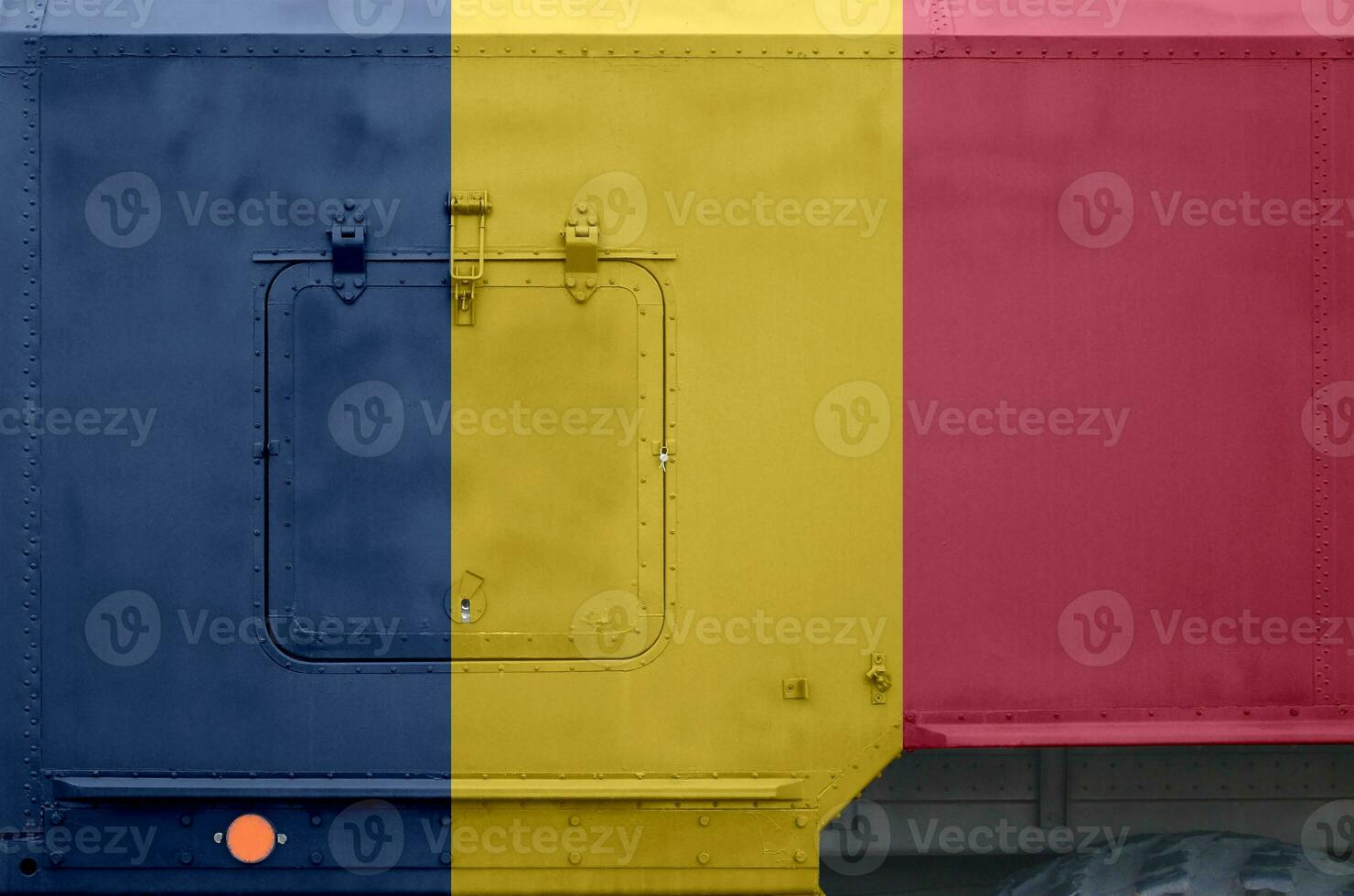 Chad flag depicted on side part of military armored truck closeup. Army forces conceptual background photo