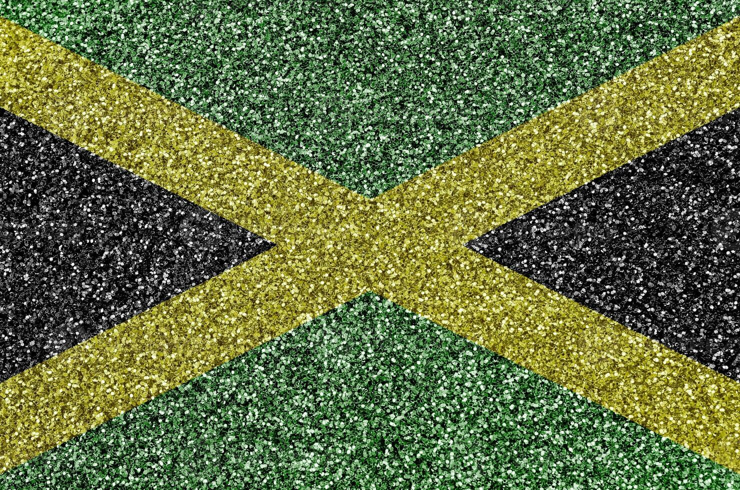 Jamaica flag depicted on many small shiny sequins. Colorful festival background for party photo