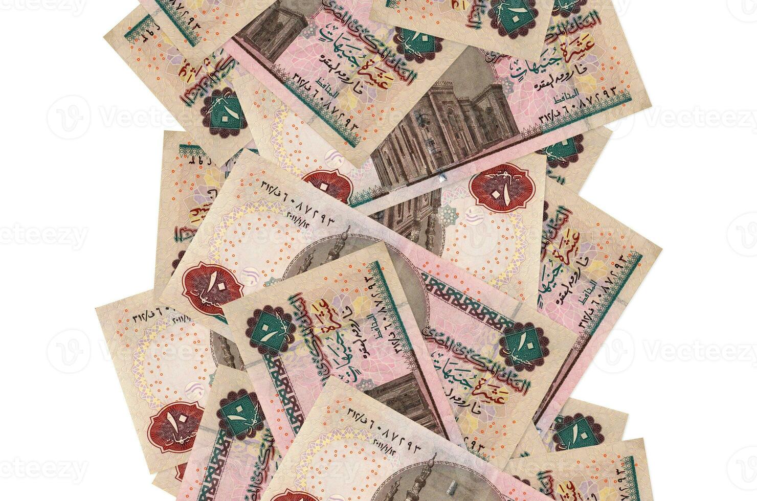 10 Egyptian pounds bills flying down isolated on white. Many banknotes falling with white copyspace on left and right side photo