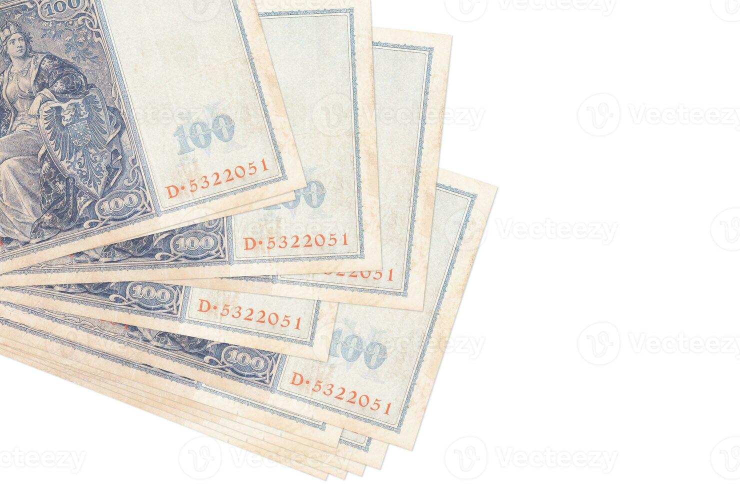 100 Reich marks bills lies in small bunch or pack isolated on white. Mockup with copy space. Business and currency exchange photo