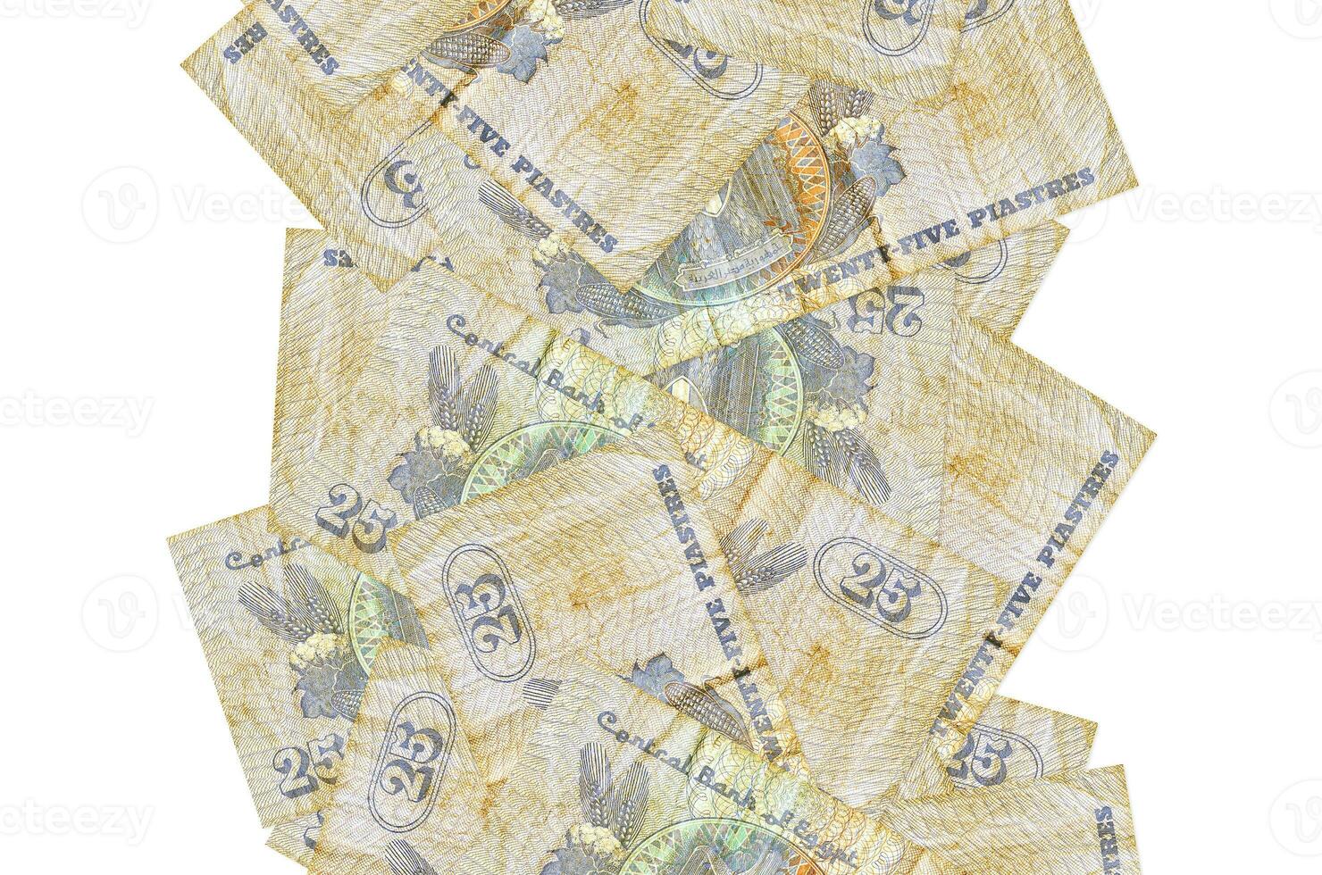 25 Egyptian piastres bills flying down isolated on white. Many banknotes falling with white copyspace on left and right side photo