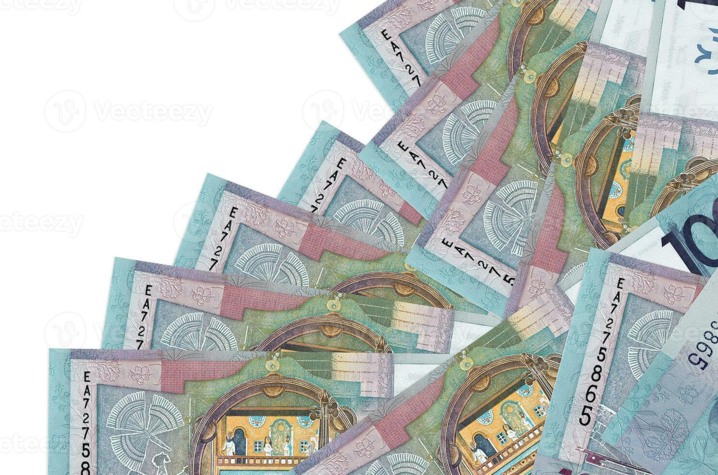 100 Belorussian rubles bills lies in different order isolated on white. Local banking or money making concept photo