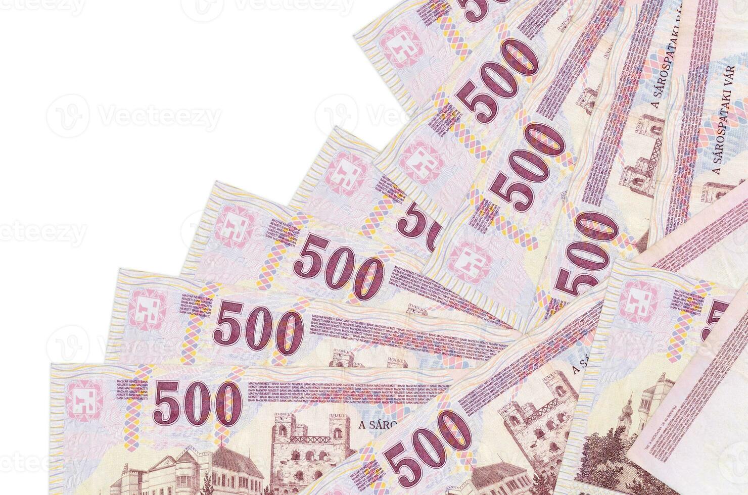 500 Hungarian forint bills lies in different order isolated on white. Local banking or money making concept photo