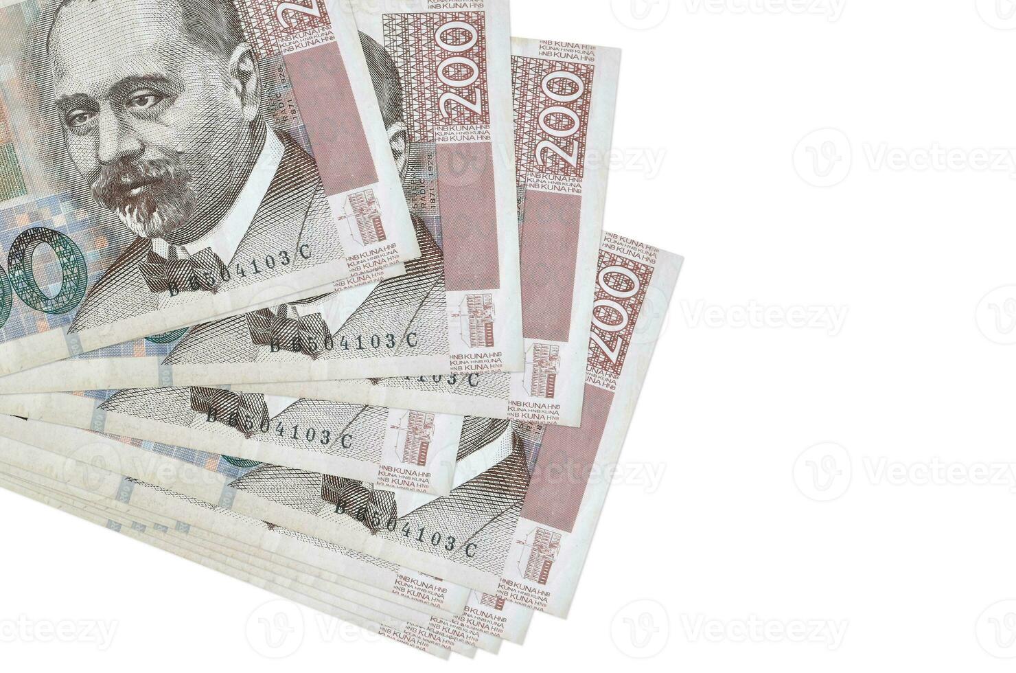 200 Croatian kuna bills lies in small bunch or pack isolated on white. Mockup with copy space. Business and currency exchange photo