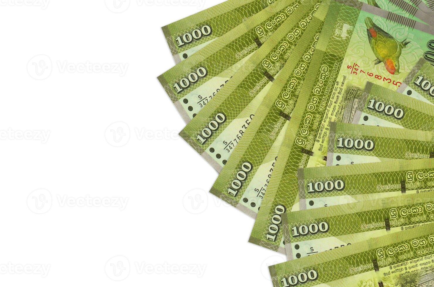 1000 Sri Lankan rupees bills lies isolated on white background with copy space. Rich life conceptual background photo