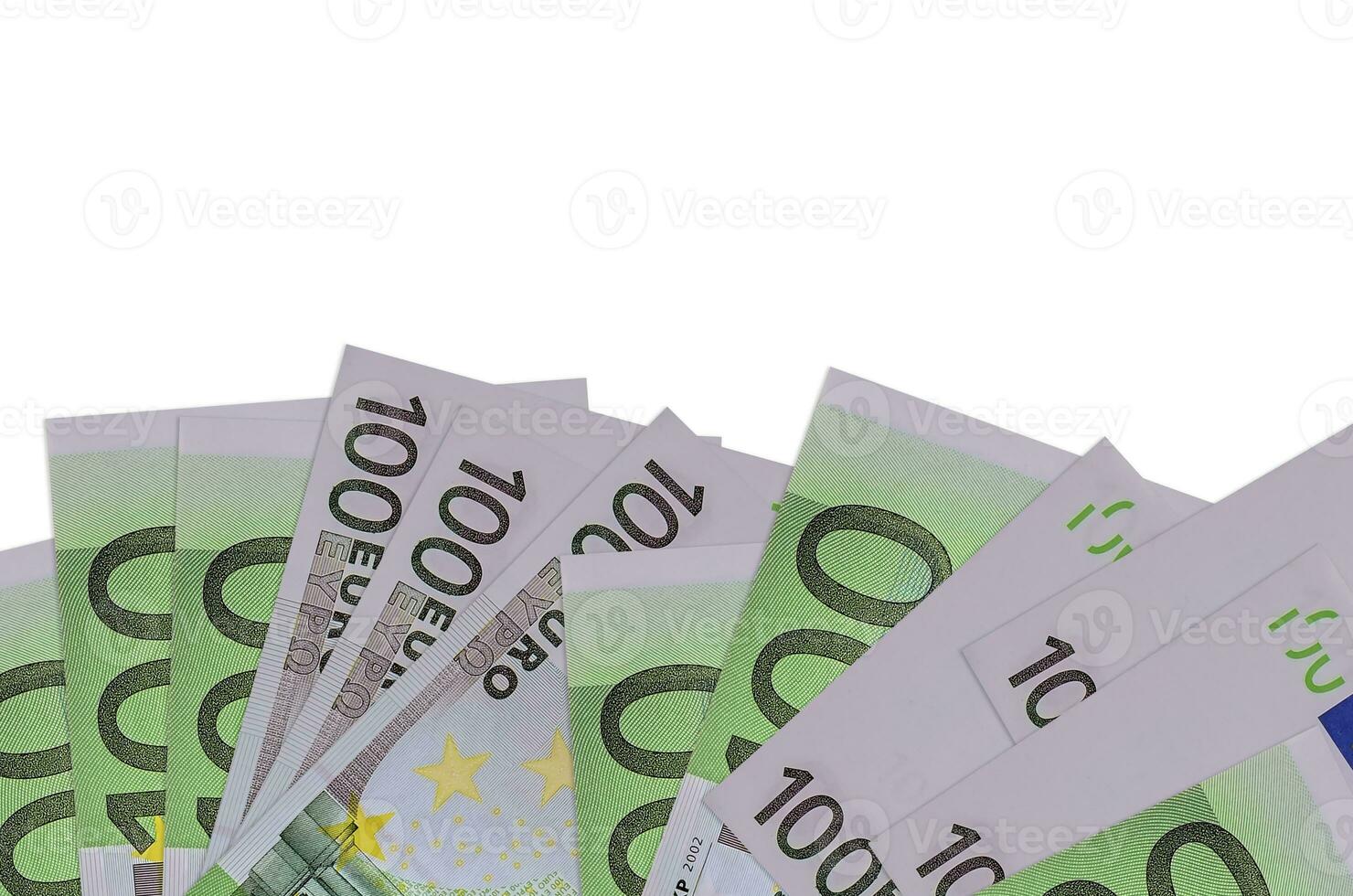 100 Euro bills lies on bottom side of screen isolated on white background with copy space. Background banner template photo