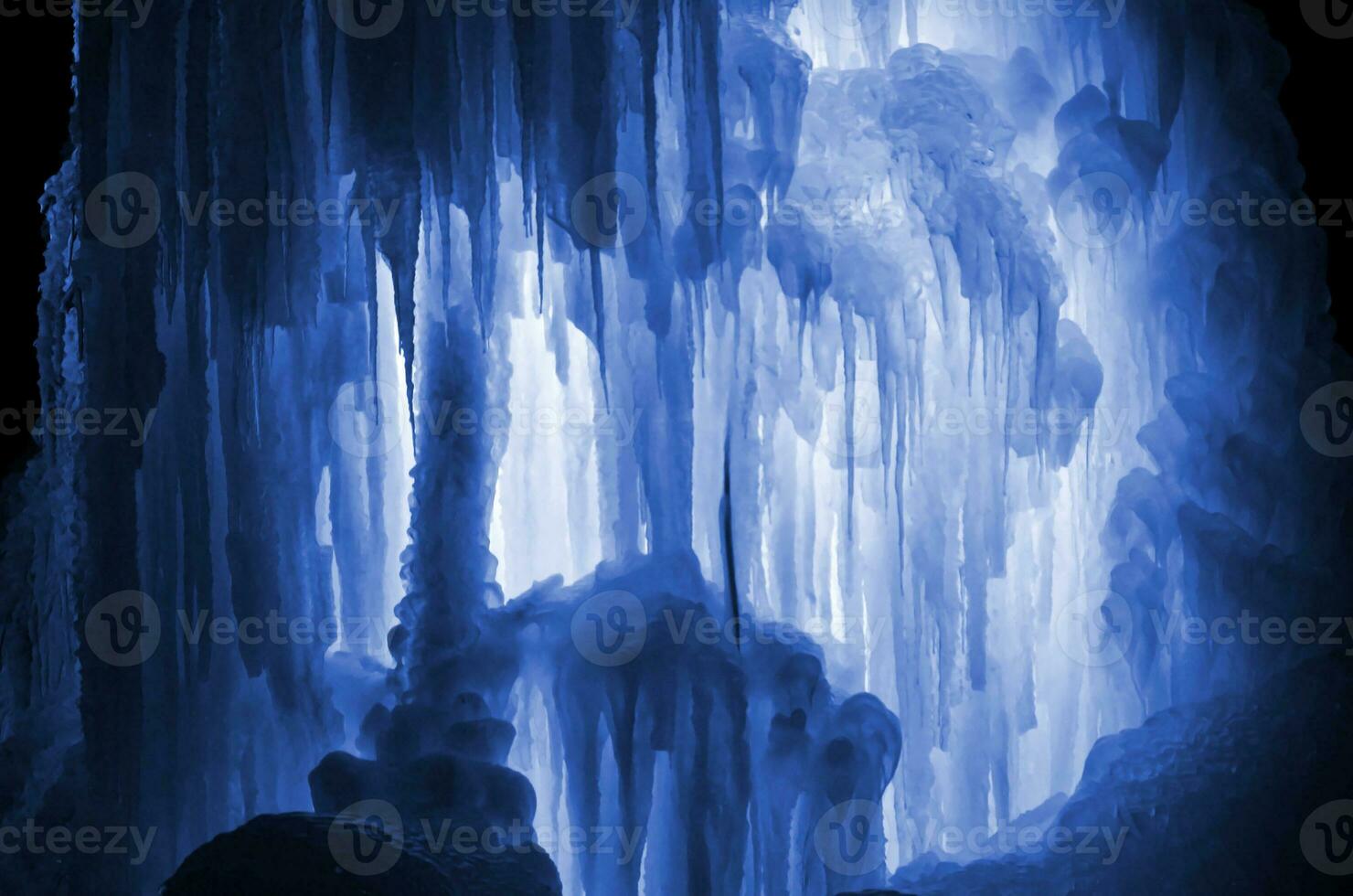Huge ice icicles large blocks of ice frozen water blue ice background