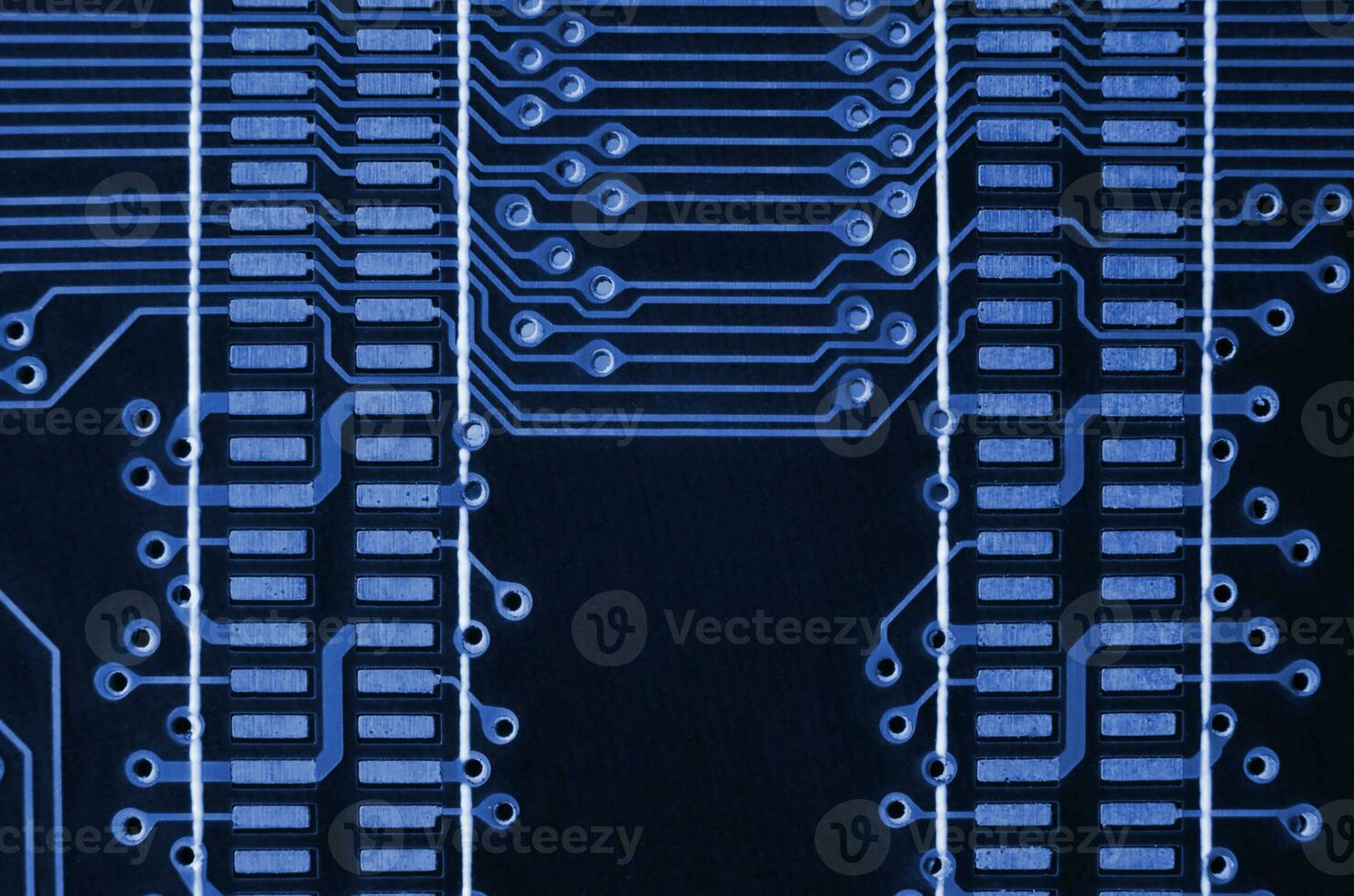 Close up of colored micro circuit board. Abstract technology background. phantom classic blue color photo