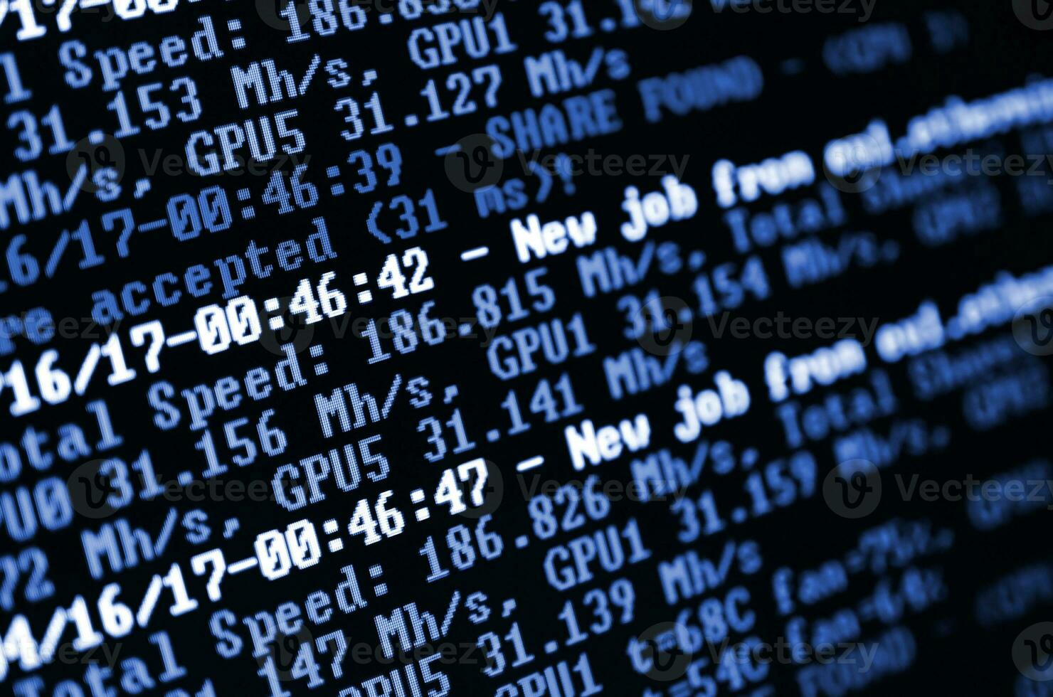 Macro snapshot of the program interface for crypto currency mining on the monitor of an office computer. The flow of information strings and data. phantom classic blue color. photo