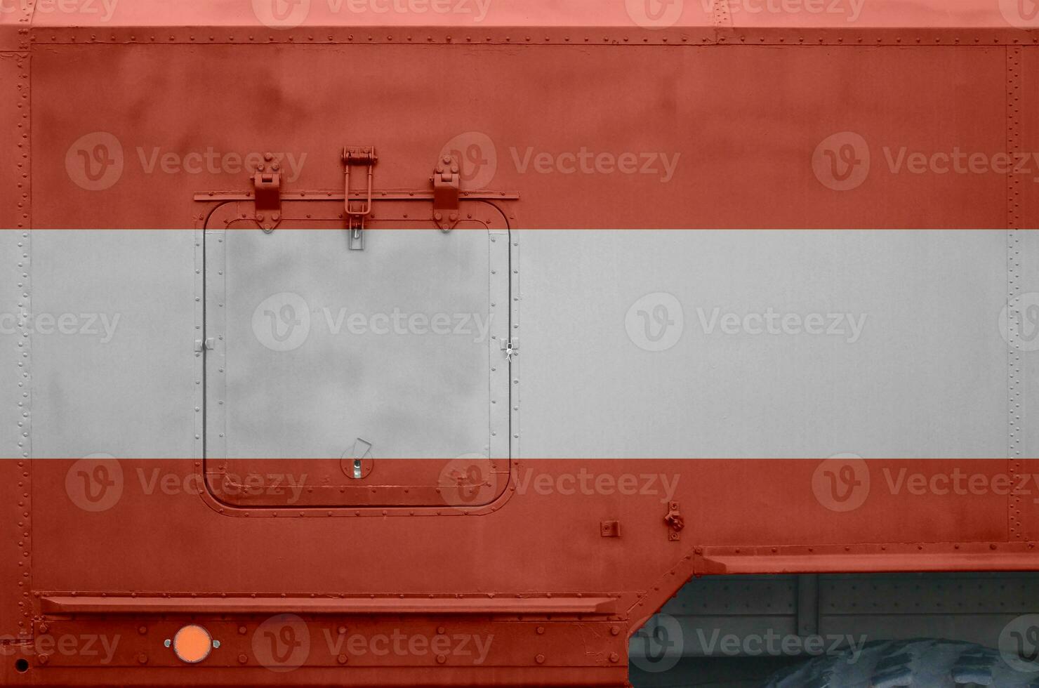 Austria flag depicted on side part of military armored truck closeup. Army forces conceptual background photo