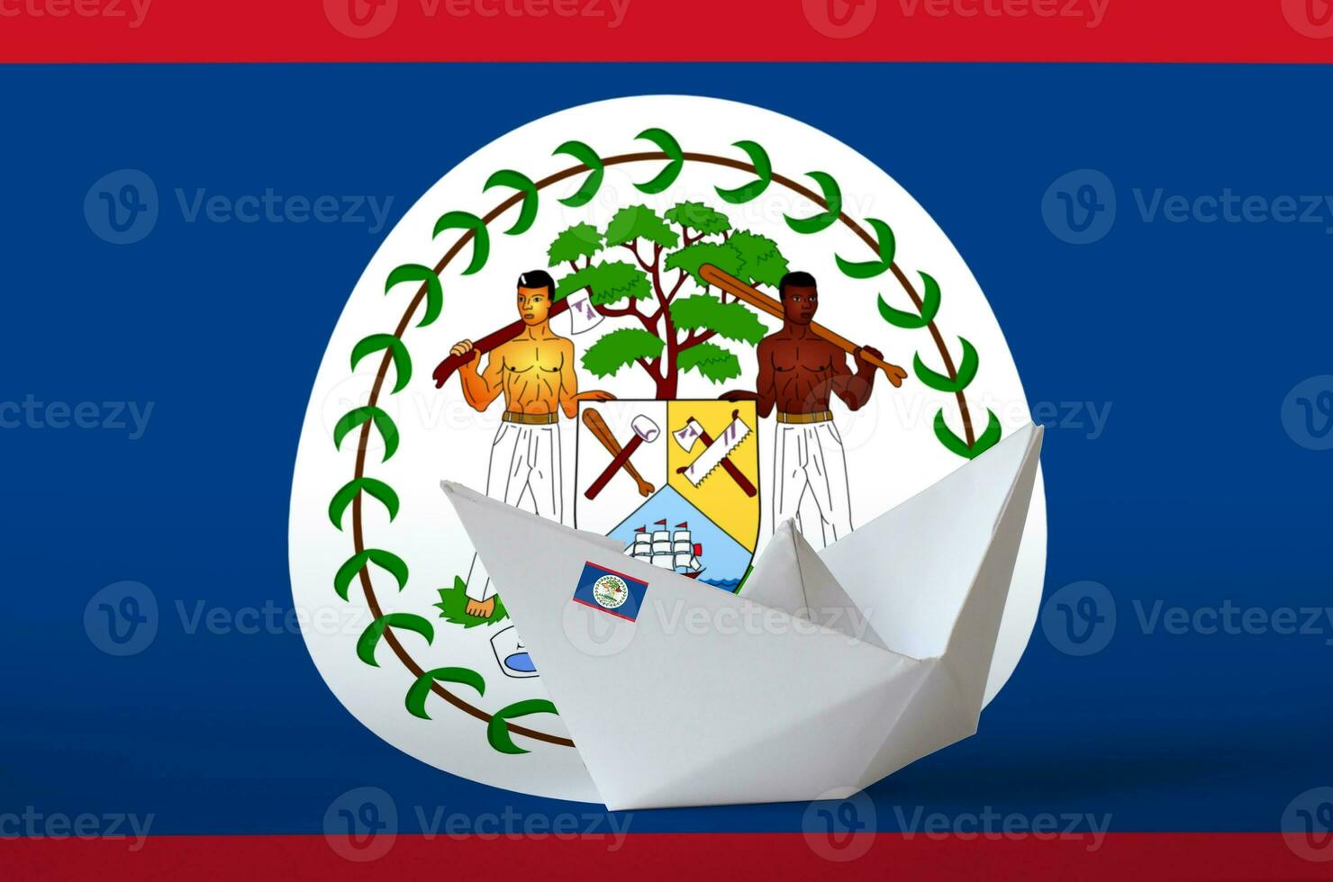 Belize flag depicted on paper origami ship closeup. Handmade arts concept photo