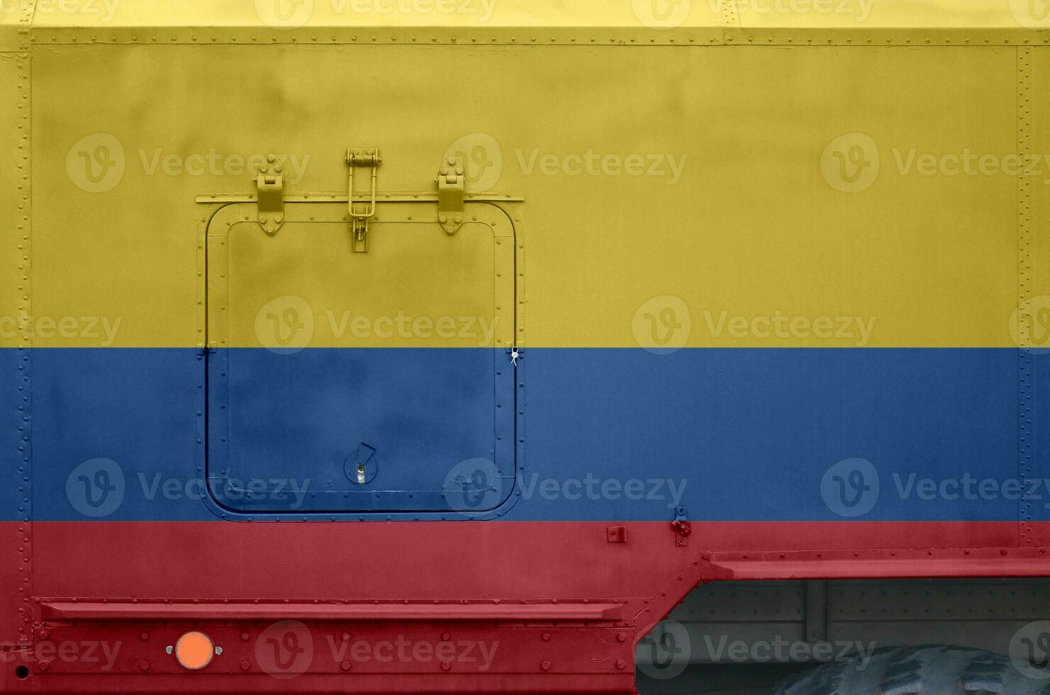 Colombia flag depicted on side part of military armored truck closeup. Army forces conceptual background photo