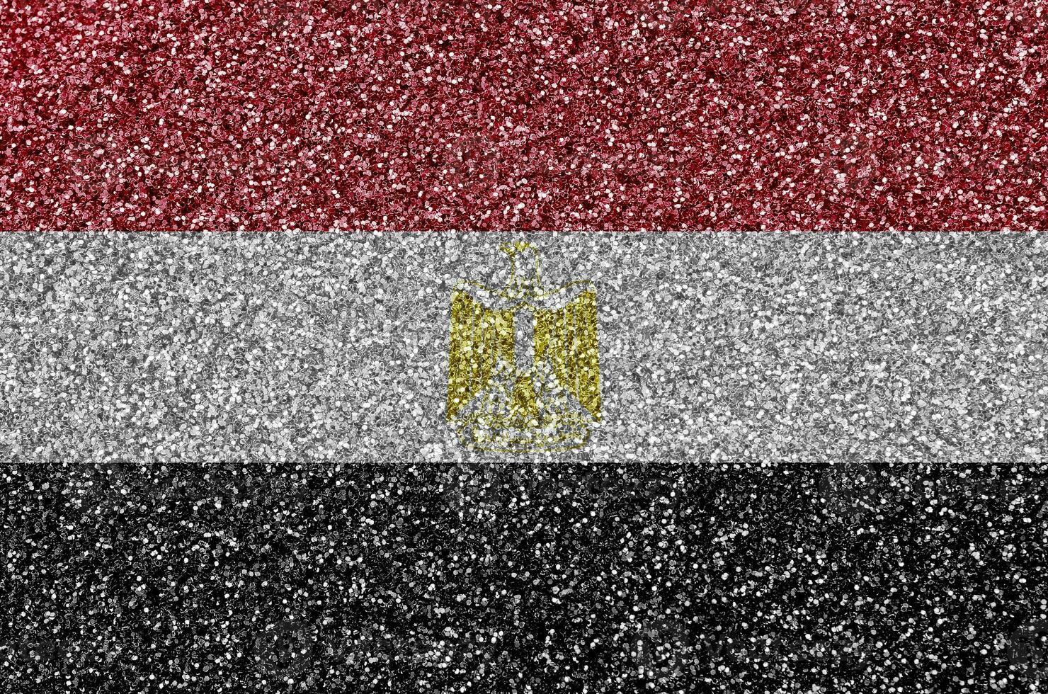 Egypt flag depicted on many small shiny sequins. Colorful festival background for party photo