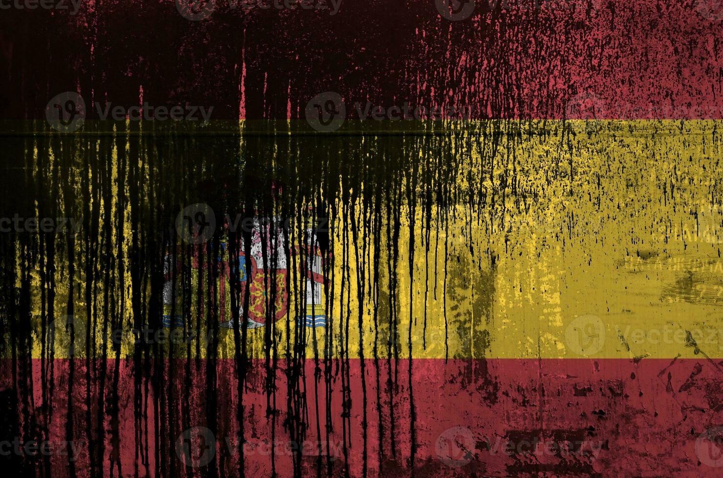 Spain flag depicted in paint colors on old and dirty oil barrel wall closeup. Textured banner on rough background photo