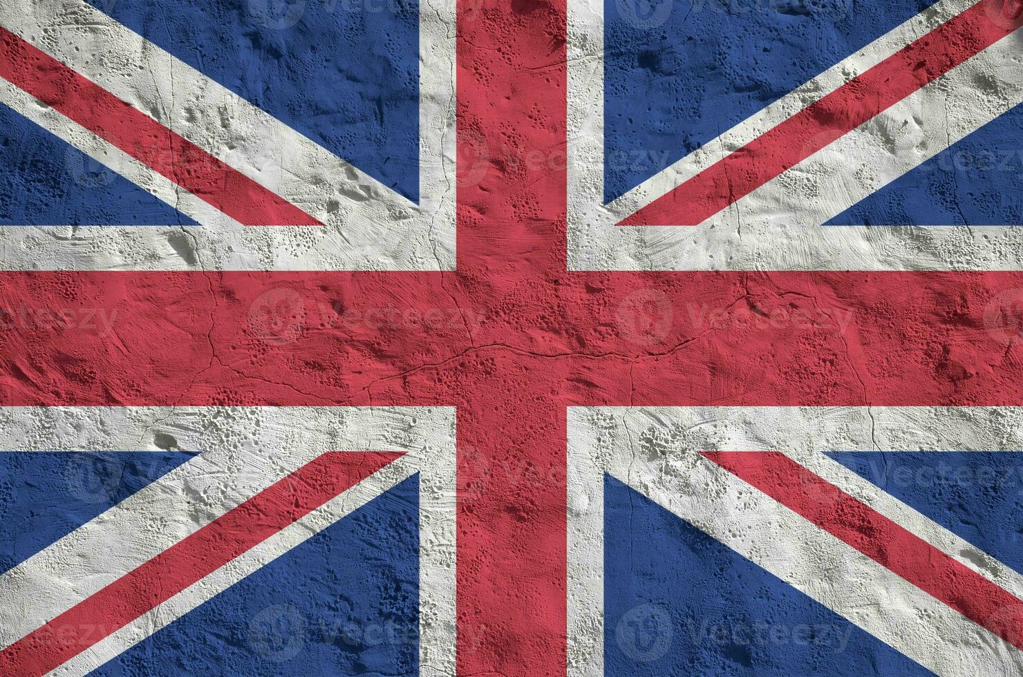 Great britain flag depicted in bright paint colors on old relief plastering wall. Textured banner on rough background photo