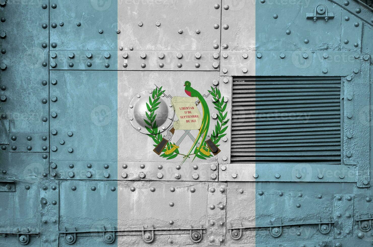Guatemala flag depicted on side part of military armored tank closeup. Army forces conceptual background photo