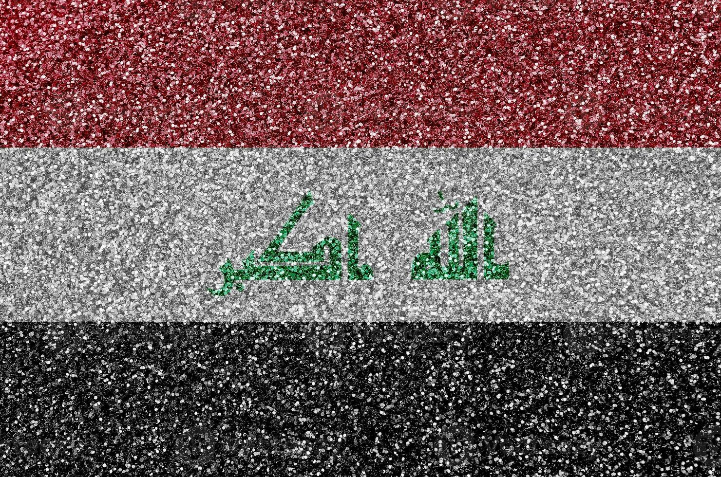 Iraq flag depicted on many small shiny sequins. Colorful festival background for party photo