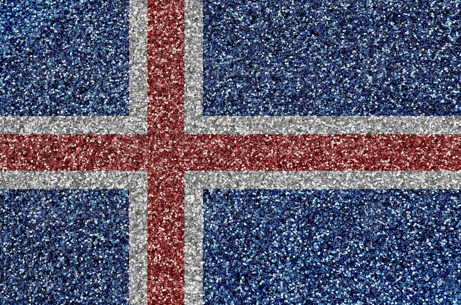 Iceland flag depicted on many small shiny sequins. Colorful festival background for party photo